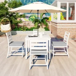 ModernLuxe 4-Seat Outdoor Dining Set with Acacia Wood Table and Cushioned Chairs