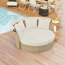 ModernLuxe Outdoor Rattan Daybed with Retractable Canopy and 4 Pillows